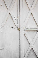 Backdrop image of old white wood barn door