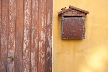 detail from an old mailbox in Burano island, Venice