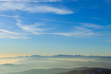 Obraz premium Mountains top on blue sky