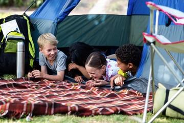 Family having fun in the tent