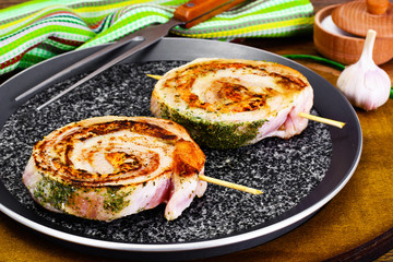 Roll of Bacon with Mushrooms, Carrots, Greens, Barbecue Grill