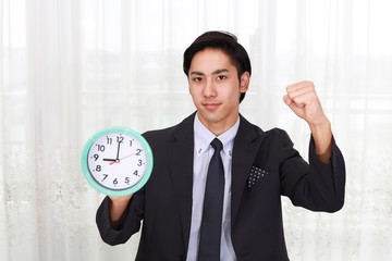 時計を持つビジネスマン