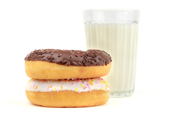 Glass of milk and donuts