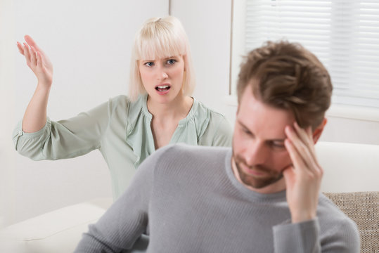 Woman Shouting To The Frustrated Man