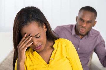 Man Having Argument With Woman