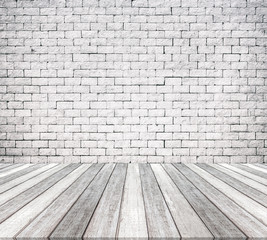 room interior with white brick wall and wooden floor 