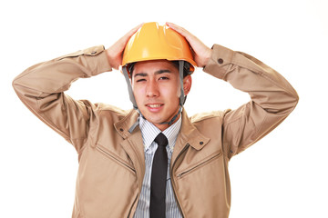 苦悩する労働者