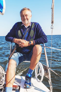 elderly man on yacht at sea