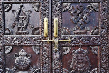 closed up the local art carving on a wood door