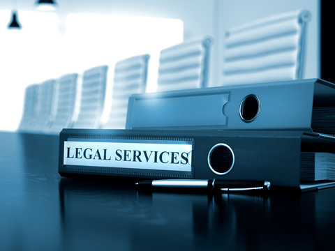 Legal Services - Illustration. Legal Services - File Folder on Black Desktop. Legal Services Concept. Binder with Inscription Legal Services on Office Desktop. Toned Image. 3D Rendering. 
