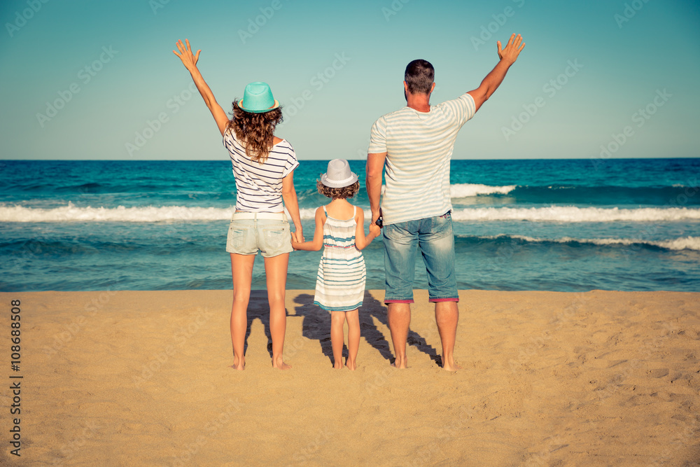 Sticker happy family having fun on the beach