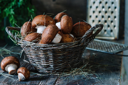 Brown mushrooms in a basket