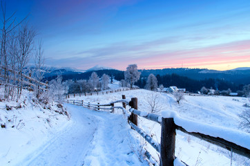 Fototapeta na wymiar Carpathian mountain valley covered with fresh snow. Majestic lan