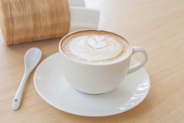 Latte Coffee art on the wooden table