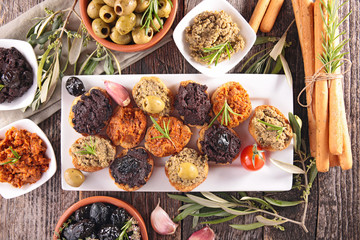 assorted canape with cracker and olive