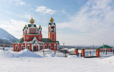 Winter views orthodox church in the Kirovsk town.Church of the H