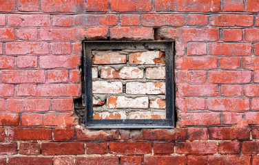 Old weathered red brick wall as background
