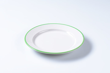 Empty rimmed dinner plate