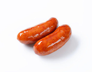 Two grilled sausages