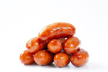 stack of pan fried sausages