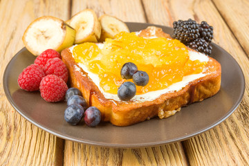 french toast with butter and marmalade