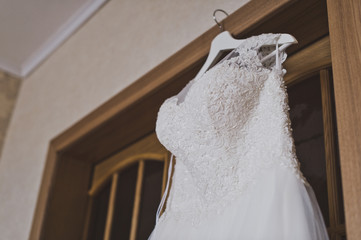 Womens wedding dress on a hanger before the wedding 5922.