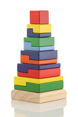 wooden pyramid children's toy isolated on white background.