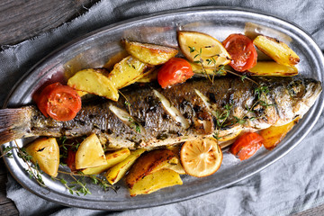 Grilled fish with potato wedges