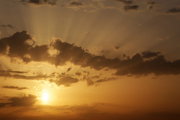 Beautiful Sunset with sun rays. Sunset sky background