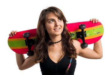 Young girl with skateboard © luismolinero