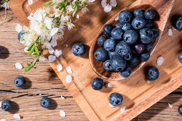 blueberries on wooden table. Blueberry antioxidant. Concept for healthy eating and nutrition