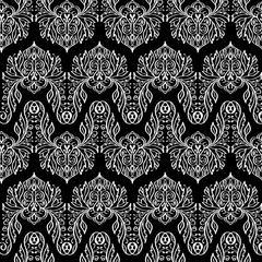 Vector seamless texture. Black and white floral pattern for design and fashion. Flowers and leaves motifs
