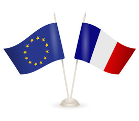 Table stand with flags of France and European Union. 