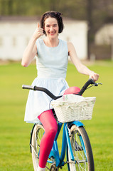 Obraz premium Joyful hipster doing like or thumbup gesture in the park