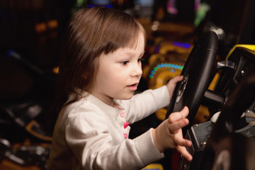 Fototapeta na wymiar little girl and slot machines