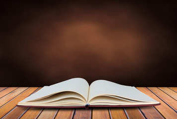 One old book on wooden table
