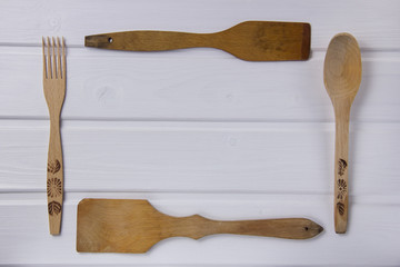 set of wooden Kitchen Tools rustic background