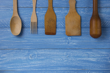 set of wooden Kitchen Tools rustic background