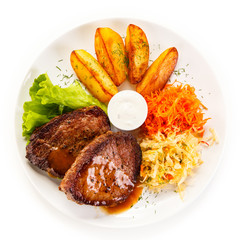 Grilled beefsteaks and vegetables 