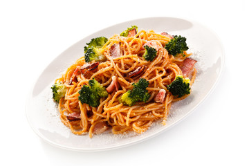 Pasta with pesto sauce, ham, Parmesan and broccoli