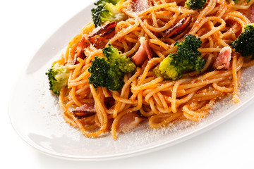 Pasta with pesto sauce, ham, Parmesan and broccoli