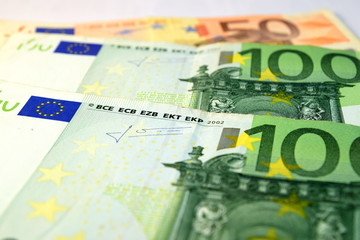 Close up of  Various currency notes and coins from different countries