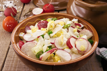 Salad from radish and egg 