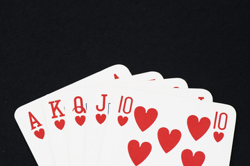 Playing card on black table, Straight flush