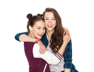 Obraz na płótnie Canvas happy smiling pretty teenage girls hugging