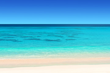 Fototapeta na wymiar seychelles tropical beach with white sand turquoise water and blue sky