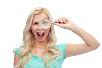 happy young woman with magnifying glass