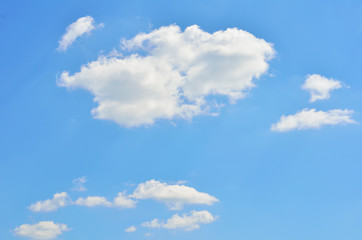 Fototapeta na wymiar Clear blue sky with white clouds