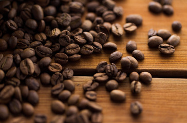 close up coffee beans on wooden table