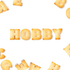 Hobby message written with homemade biscuits, on white background.